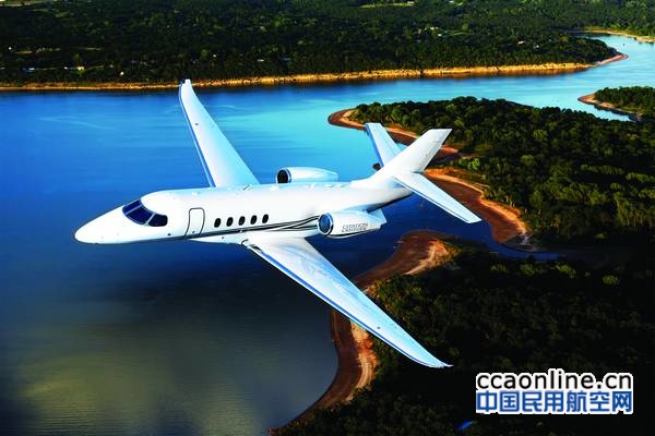 Aerial photography of the Textron Cessna Latitude business jet flying over Keystone Lake, west of Tulsa, OK. Mid-Continent Airport (ICT) Wichita KS USA